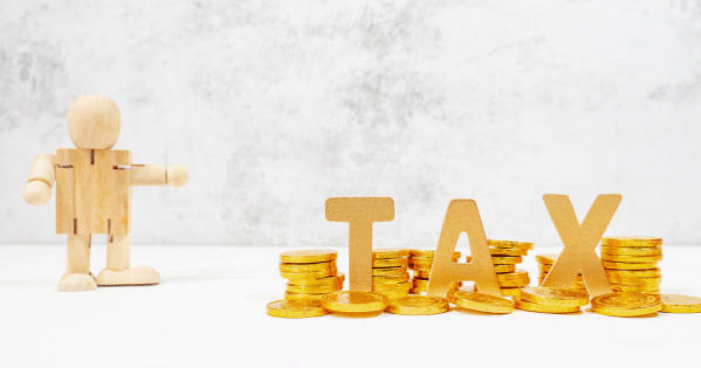 Gold bars showing GST and tax impact on gold investment returns in India